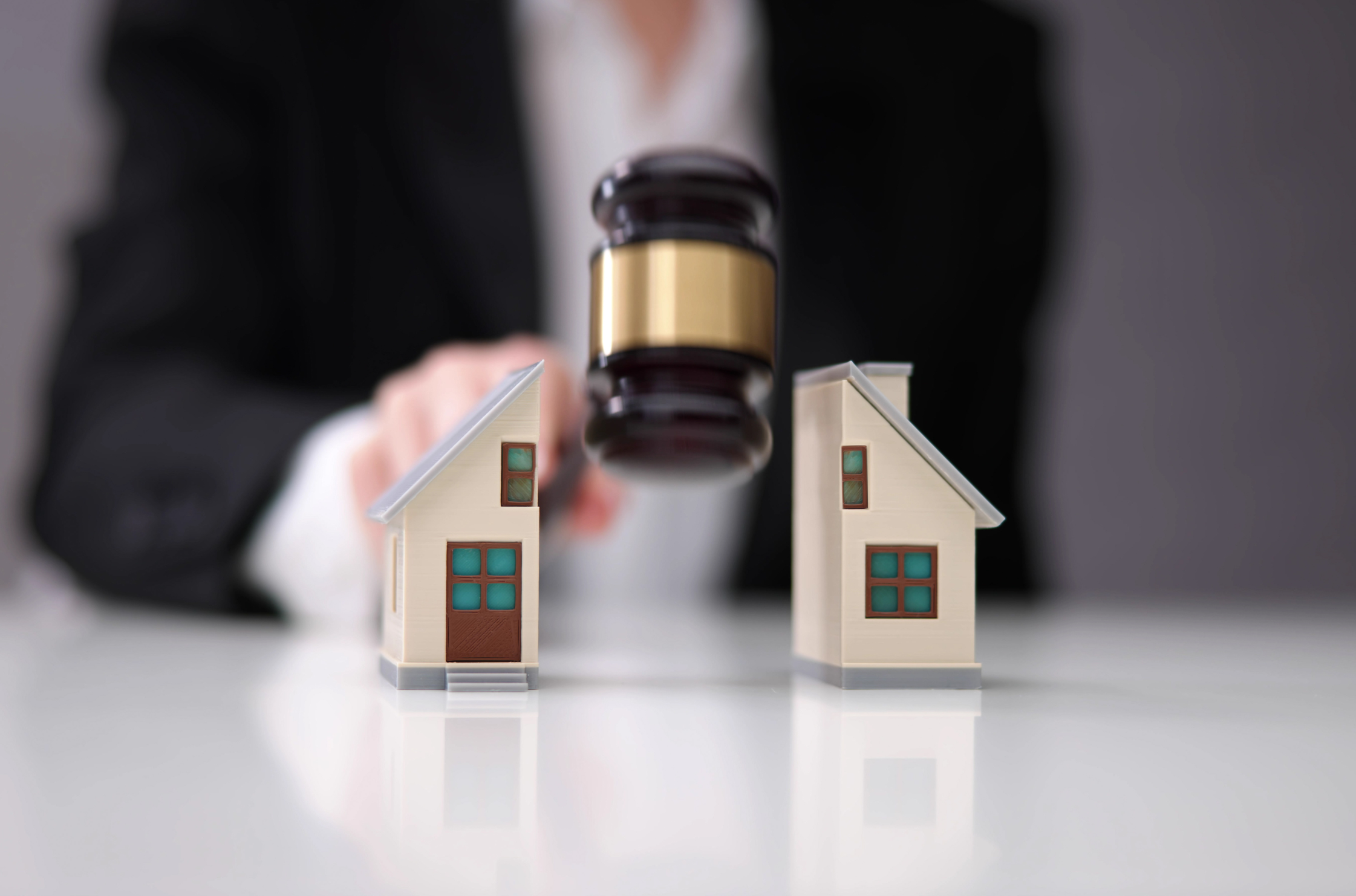 in-house-attorney-access.jpg gavel-breaking-house-model.jpg